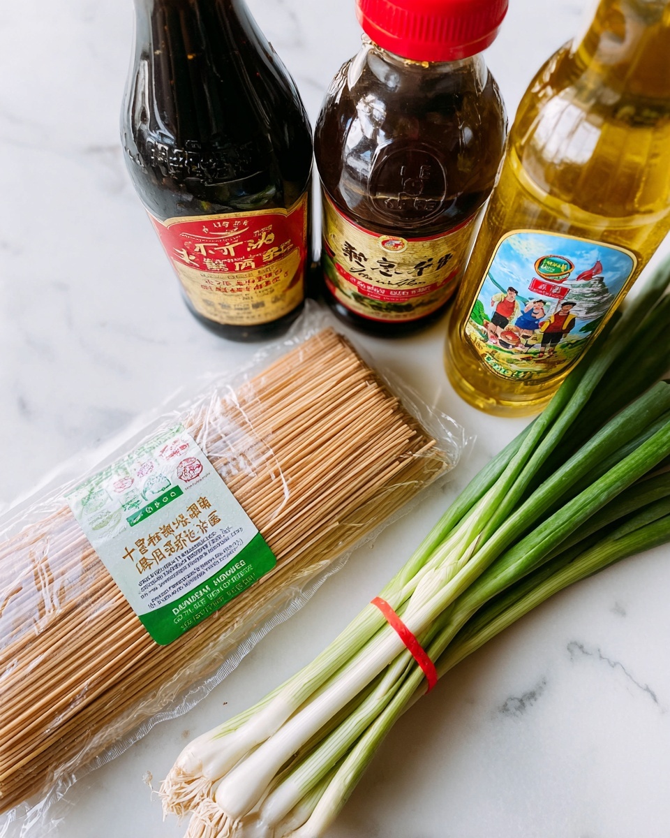 The image shows a close-up of cooking ingredients placed on a white marbled surface. There is a clear plastic package of light brown lo mein noodles with green and red details on the label, laying flat in the center. To the left, there is a dark brown bottle of soy sauce with a gold and red label. Behind the noodle package, slightly to the right, is a bottle with a brown liquid and a colorful label featuring people, next to a tall clear bottle with light golden oil. In the front right corner, a bunch of green onions with white bases and long green stalks is tied together with a red rubber band. The overall composition is bright and clean, showing simple fresh ingredients. photo taken with an iphone --ar 4:5 --v 7