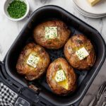 Air Fryer Baked Potatoes with Butter and Black Pepper Recipe