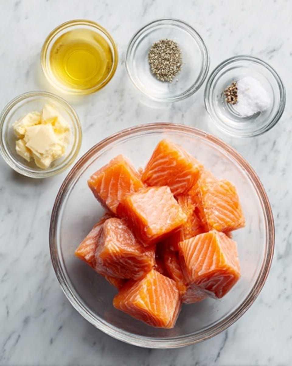 A clear glass bowl sits at the center, filled with thick, square orange pieces of raw salmon, showing light and dark orange stripes. Around the bowl are five small clear glass bowls, each holding different ingredients: melted yellow butter, a light beige thick sauce, small white grains of salt, small black and white pepper, and a transparent liquid. All bowls rest on a white marbled surface with soft veins, creating a clean and fresh look. Photo taken with an iphone --ar 4:5 --v 7