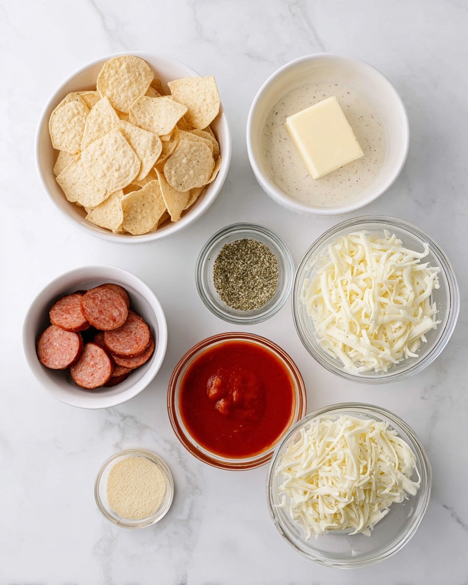 The image shows seven small bowls arranged on a white marbled surface. The top left white bowl is filled with small, round beige tortilla chips that have a slightly rough texture. Below it, a small clear glass bowl contains a square piece of pale yellow butter. Next to the butter, to the right, a small clear glass bowl holds a greenish dried herb mix in a fine texture. Above this bowl, a medium white bowl is filled with a smooth thick white sauce with small black specks. In the center is a clear glass bowl filled with a bright red sauce that looks smooth and thick. To the right of the sauce, a white bowl contains a heap of finely shredded white cheese. At the bottom left, a white bowl holds sliced pieces of reddish-brown sausage with a smooth surface. Lastly, at the bottom right, a small clear glass bowl contains a small pile of pale yellow granulated powder. Photo taken with an iphone --ar 4:5 --v 7