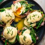 Eggs Benedict for a Crowd: Poached Eggs, Canadian Bacon, and Hollandaise on Toasted English Muffins Recipe