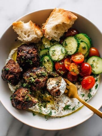 Sheet Pan Meatballs with Tomato Salad and Green Sauce Recipe