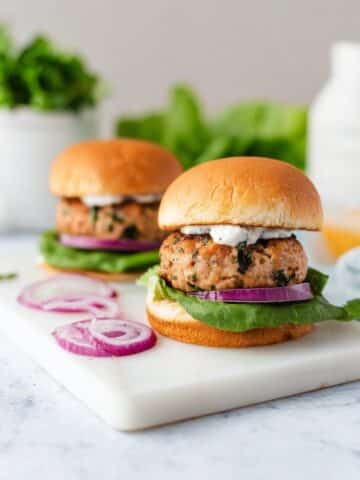 Greek Turkey Burgers with Feta, Sun-Dried Tomatoes, and Tzatziki Recipe