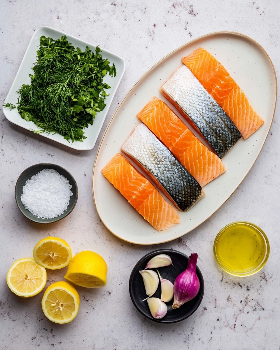 An oval white plate holds four pieces of raw salmon fillets arranged in a row, alternating skin side up and flesh side up, showing bright orange fish with silver-gray skin. To the left, a small white square plate piled with green herbs including parsley and dill is placed. Below it, a tiny white square bowl with salt sits next to two half lemon slices showing bright yellow inside. Next, a small black bowl contains two cloves of garlic, and beside it lies a small whole purple shallot. On the far right, a clear glass cup holds light yellow oil. All items are laid on a white marbled surface. Photo taken with an iphone --ar 4:5 --v 7