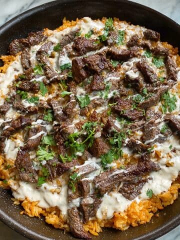 Steak, Cheese, and Rice Skillet with White Queso Recipe