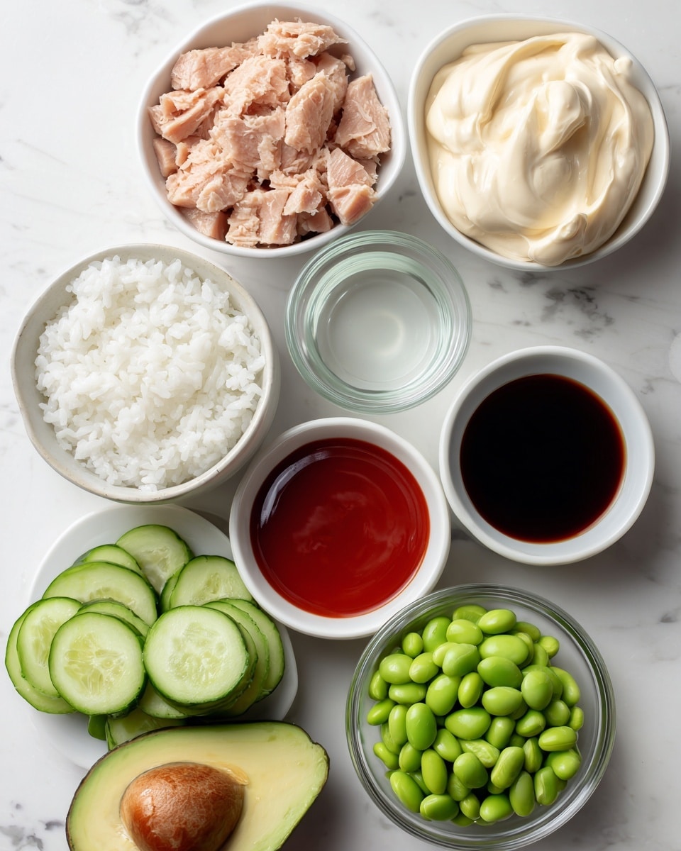 The image shows a collection of ingredients arranged neatly on a white marbled surface. In the center, there is a white bowl filled with cooked sushi rice, which appears fluffy and white. Above it, a white bowl holds chunks of canned tuna with a light pinkish-brown color and a flaky texture. To the right of the tuna, another white bowl contains kewpie mayonnaise, smooth and creamy with a pale yellow color. Below the mayonnaise, a small white bowl is filled with dark soy sauce, glossy and thick. Next to the soy sauce is a white bowl with bright red sriracha sauce, smooth and vibrant. A white bowl with clear rice wine vinegar is placed above the rice, its liquid transparent. On the right side of the rice bowl, a half avocado rests with its green flesh and dark seed visible. At the bottom, a white bowl holds fresh cucumber slices, bright green with pale centers, while next to it, a clear glass bowl is filled with green edamame beans, shiny and round. photo taken with an iphone --ar 4:5 --v 7