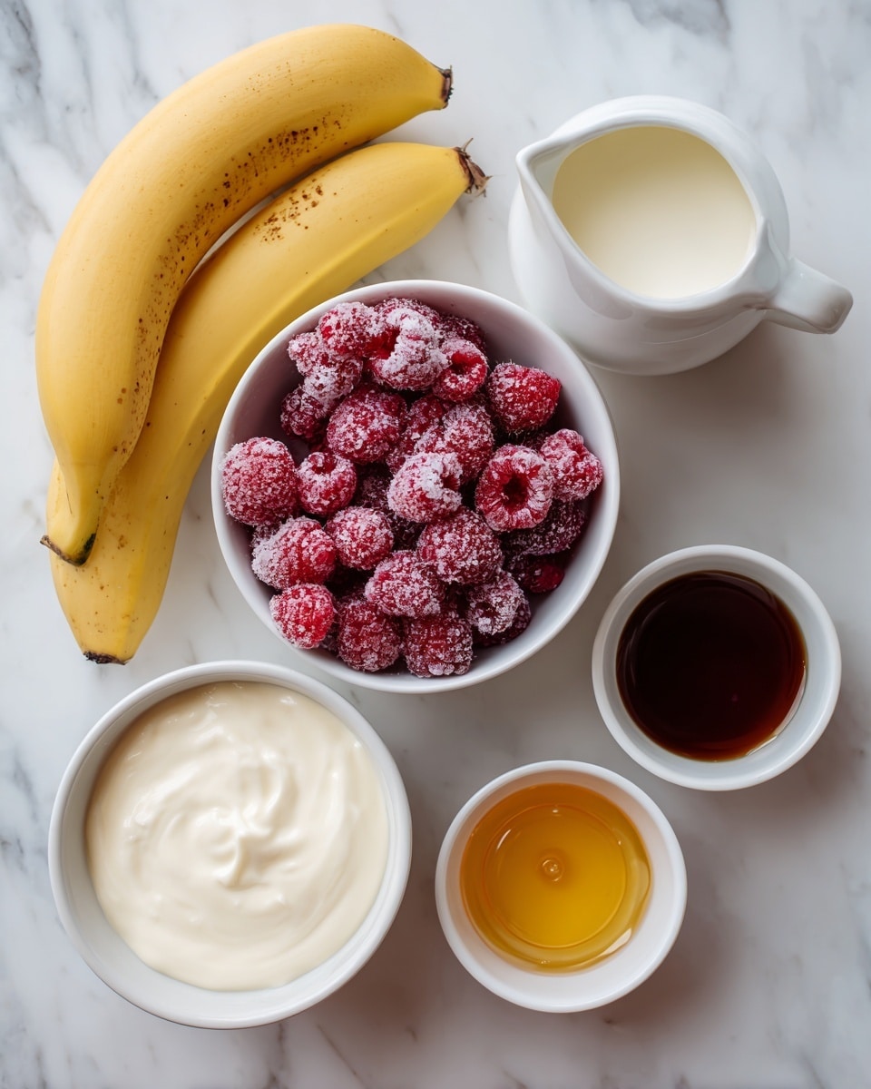 The image shows six ingredients placed on a white marbled surface. At the top, two yellow bananas with small brown spots lay side by side. Below the bananas, a white bowl filled with frozen raspberries, covered in frosty ice crystals, stands out with bright red and frosty textures. To the right of the raspberries is a small white jug with milk, slightly creamy in color. Below the raspberries is a white bowl with thick, smooth white yogurt. Next to the yogurt are two small white bowls, one filled with a golden yellow honey and the other with a dark brown vanilla extract, both glossy and liquid. photo taken with an iphone --ar 4:5 --v 7